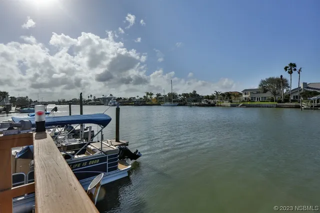 a view of a outdoor sitting area with furniture