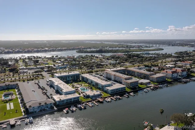 an aerial view of a city with houses