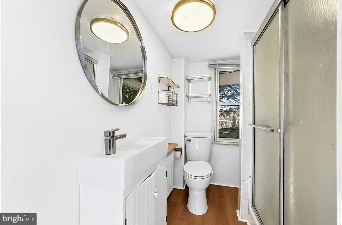 85 Price Street Bala Cynwyd, PA 19004 - Photo 14 of 44 a bathroom with a toilet and a mirror