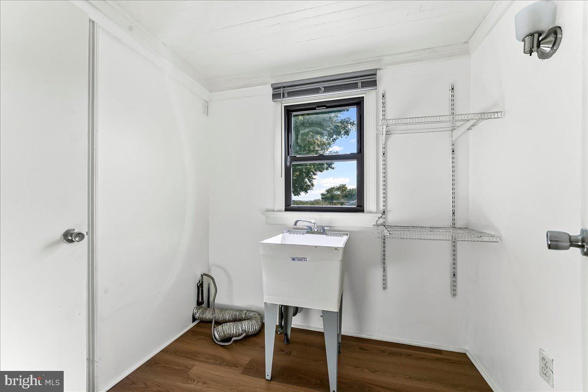 85 Price Street Bala Cynwyd, PA 19004 - Photo 15 of 44 a view of a workspace with wooden floor and a window