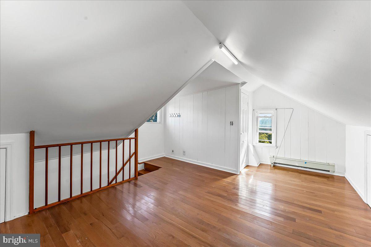 85 Price Street Bala Cynwyd, PA 19004 - Photo 22 of 44 a view of an empty room with wooden floor and a window