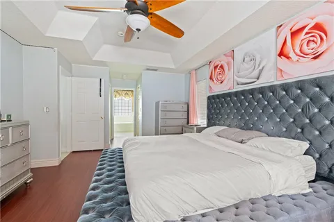 a bedroom with a bed and a dresser