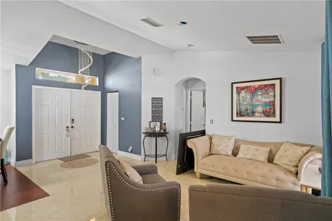 a living room with furniture and a couch