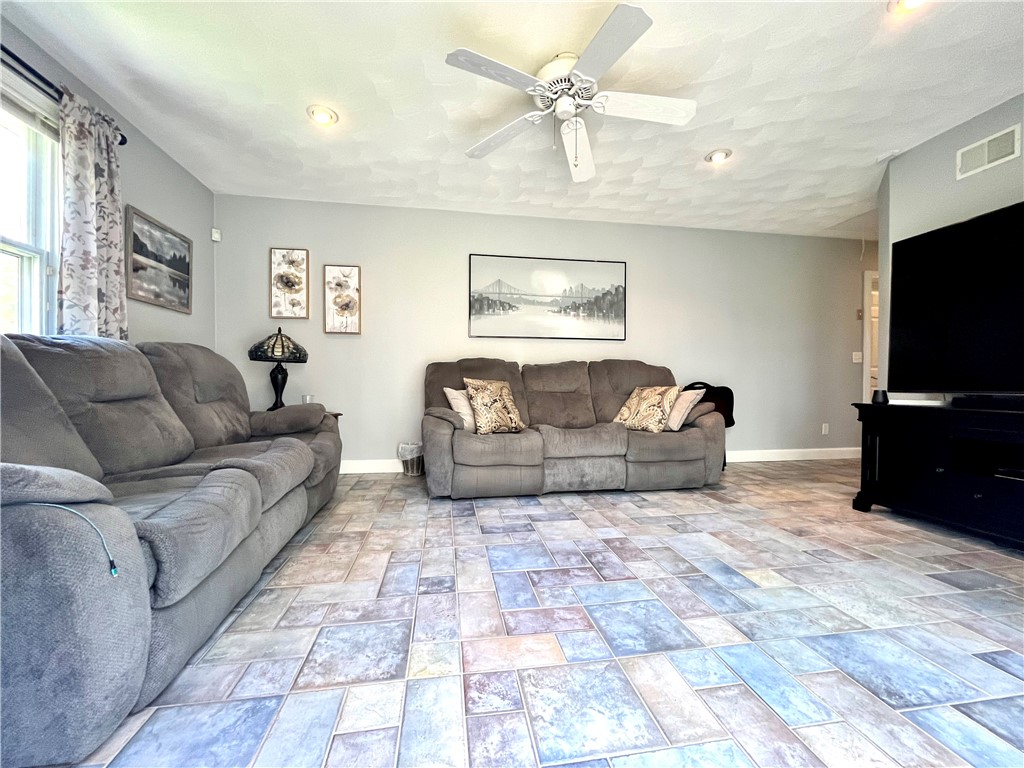 280 Pippin Orchard Road Cranston, RI 02921 - Photo 23 of 39 Family room with subway tile. This room can EASILY be converted to a master suite