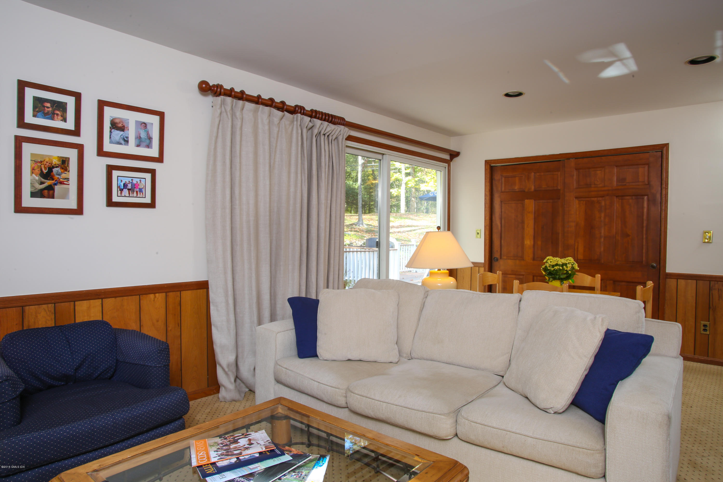36 Burning Tree Road Greenwich, CT 06830 - Photo 16 of 25 a living room with furniture and a couch