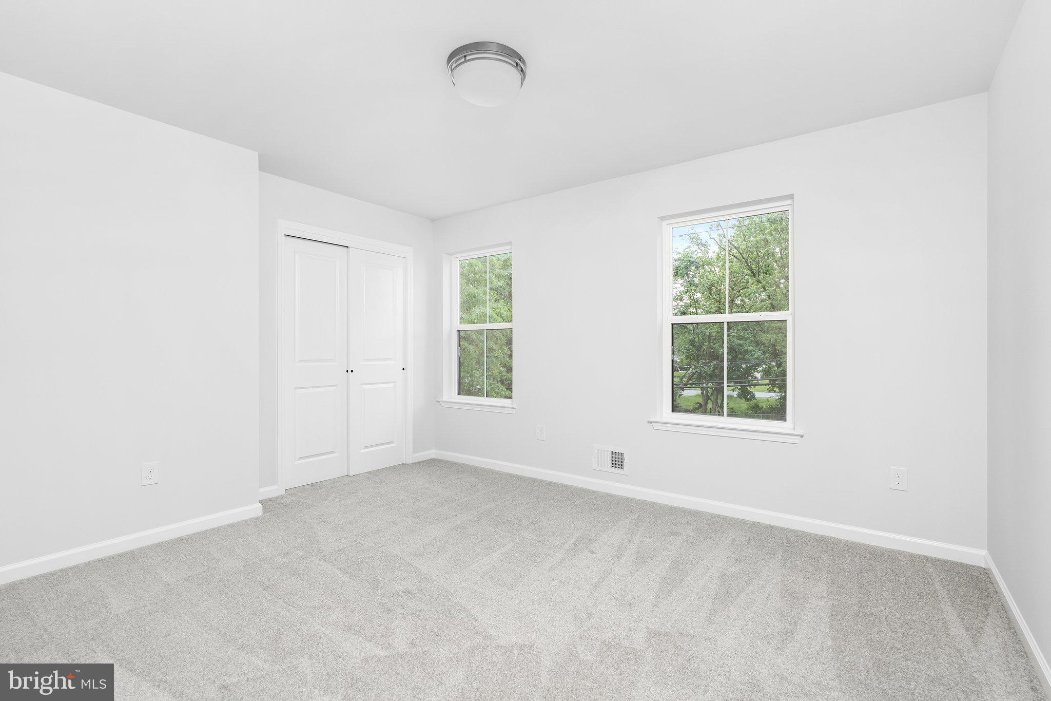 4913 South Broad Street Hamilton, NJ 08620 - Photo 23 of 31 an empty room with windows
