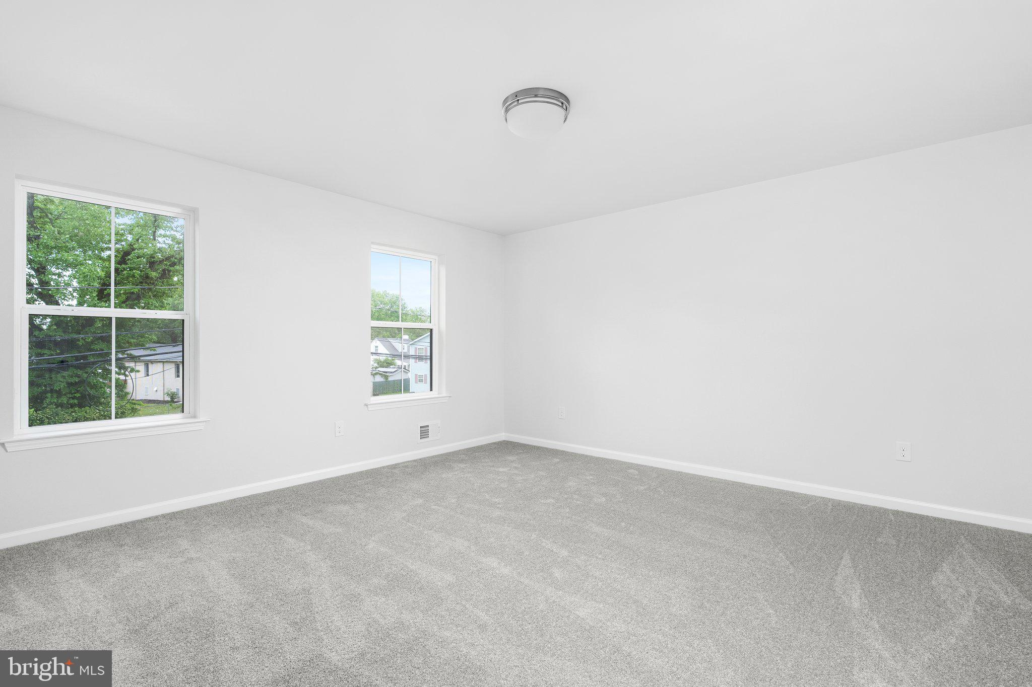 4913 South Broad Street Hamilton, NJ 08620 - Photo 24 of 31 an empty room with a window