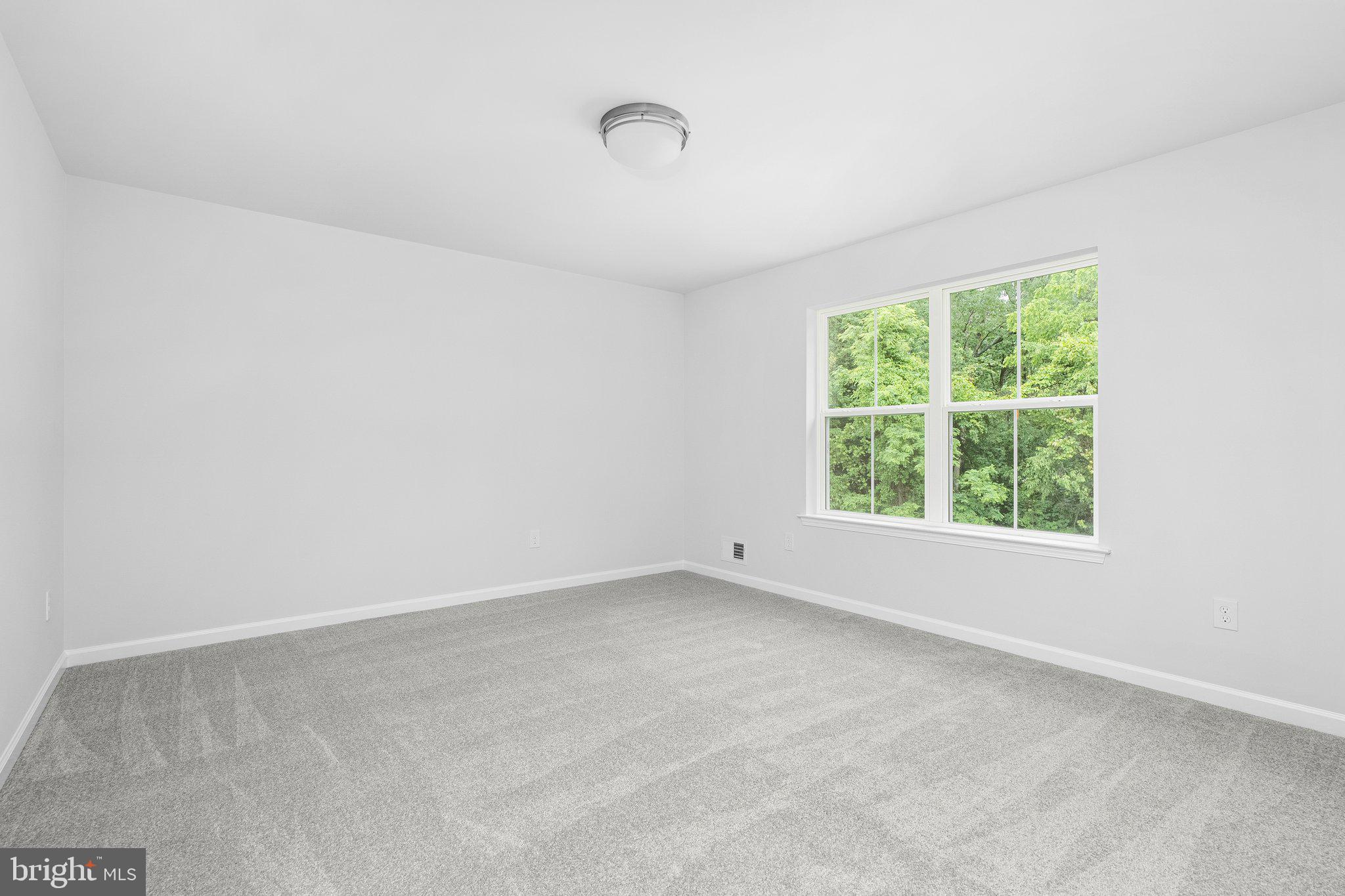 4913 South Broad Street Hamilton, NJ 08620 - Photo 25 of 31 an empty room with a window