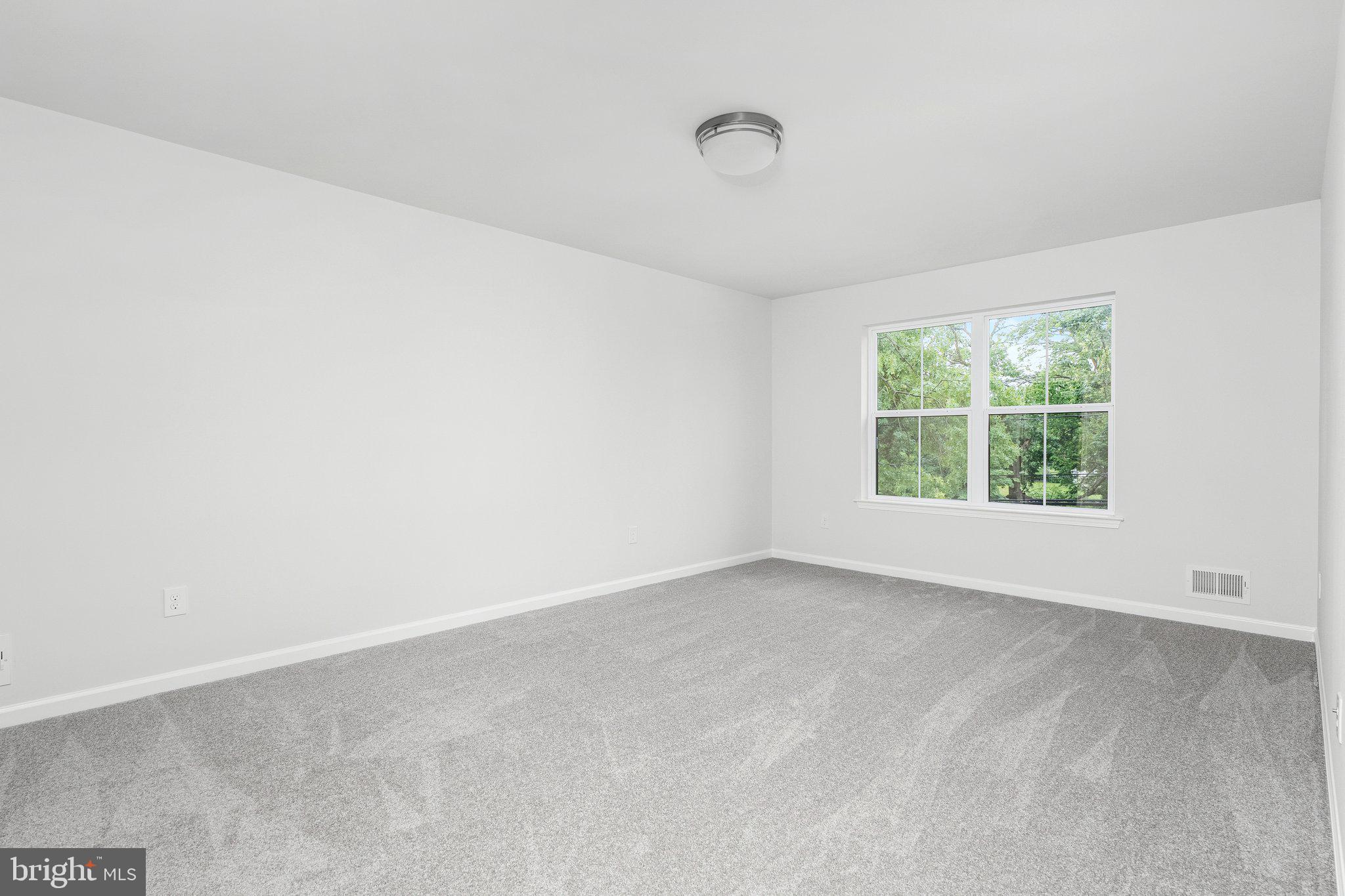 4913 South Broad Street Hamilton, NJ 08620 - Photo 31 of 31 an empty room with a window