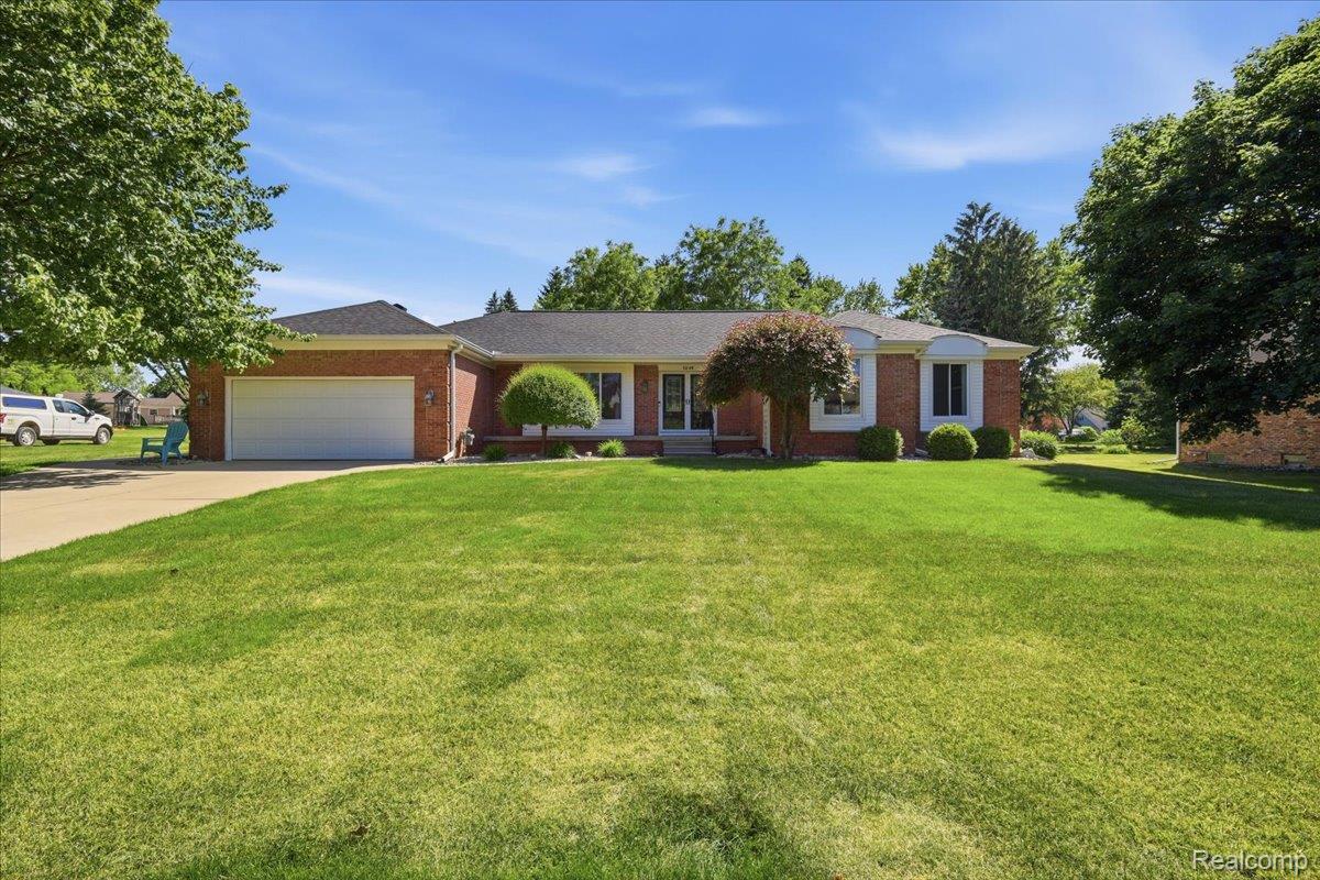 5048 Tree Hill Road Grand Blanc, MI 48439 - Photo 2 of 60 A beautiful all-brick ranch in the Tanglewood neighborhood
