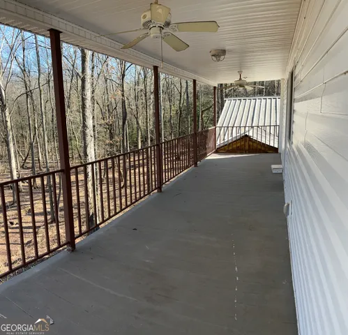 a view of a balcony with staircase