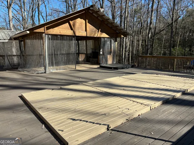 a view of a brick building on the side of a street