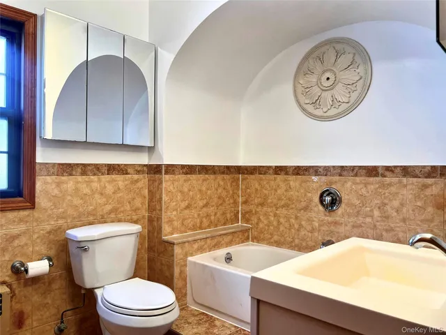 a bathroom with a sink and a toilet