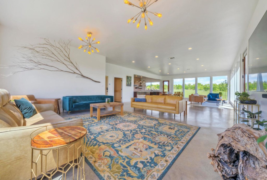 3 County Road, Unit 3 Elgin, TX 78621 - Photo 14 of 37 a living room with furniture and a large window