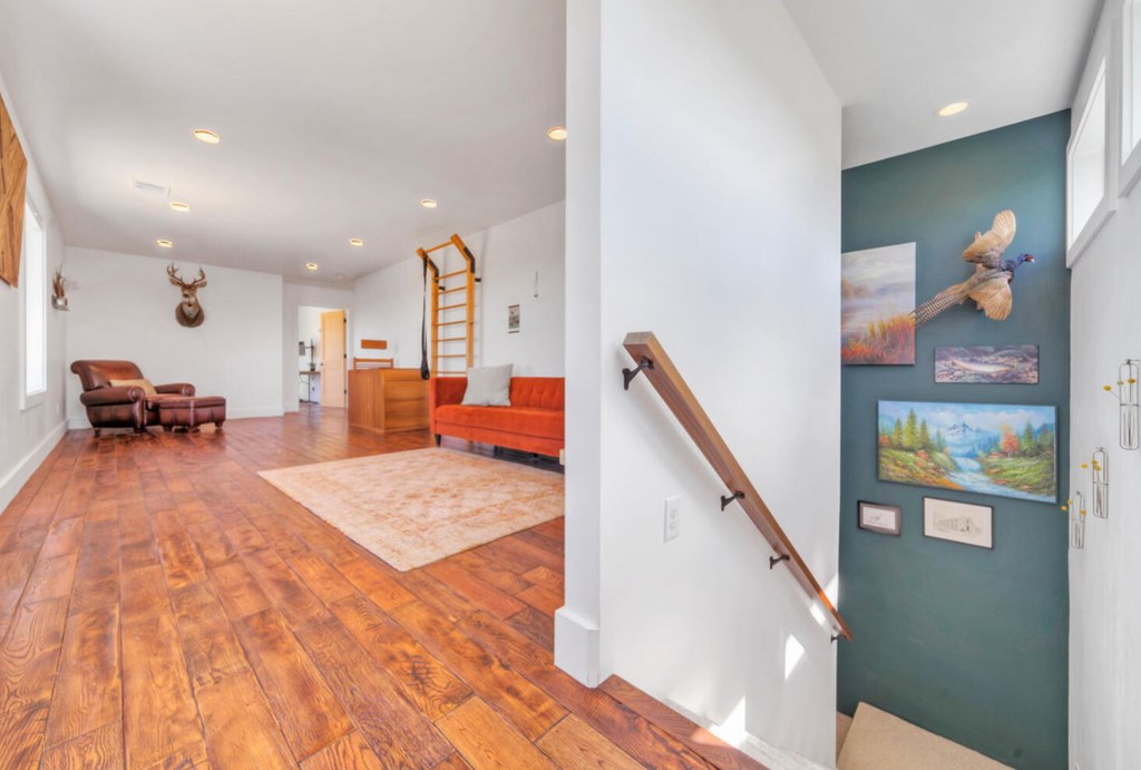 3 County Road, Unit 3 Elgin, TX 78621 - Photo 15 of 37 a living room with furniture and wooden floor