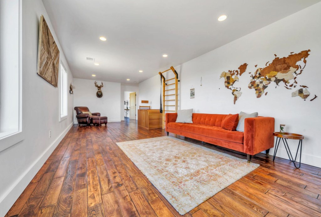 3 County Road, Unit 3 Elgin, TX 78621 - Photo 16 of 37 a living room with furniture and a rug