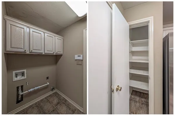 a view of a utility room with closet empty shelves