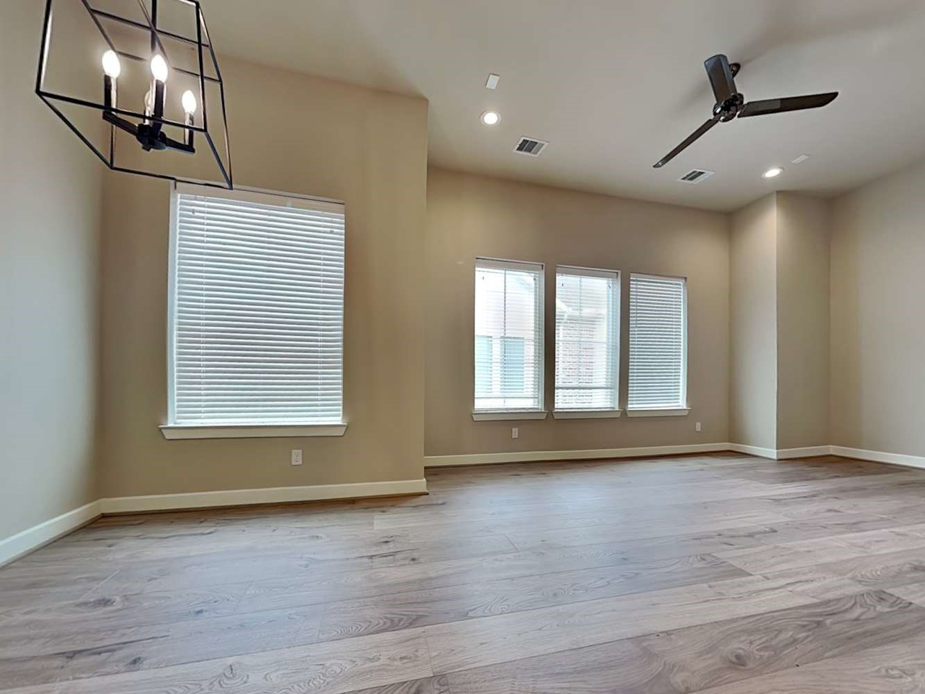6347 Paddington Bend Drive Houston, TX 77008 - Photo 3 of 14 a view of livingroom with hardwood floor and window