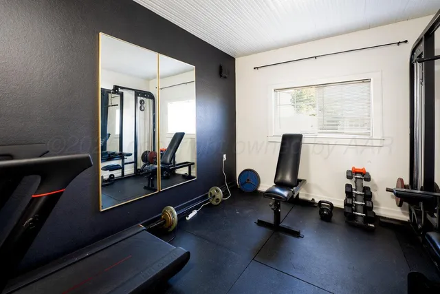 a view of a room with gym equipment
