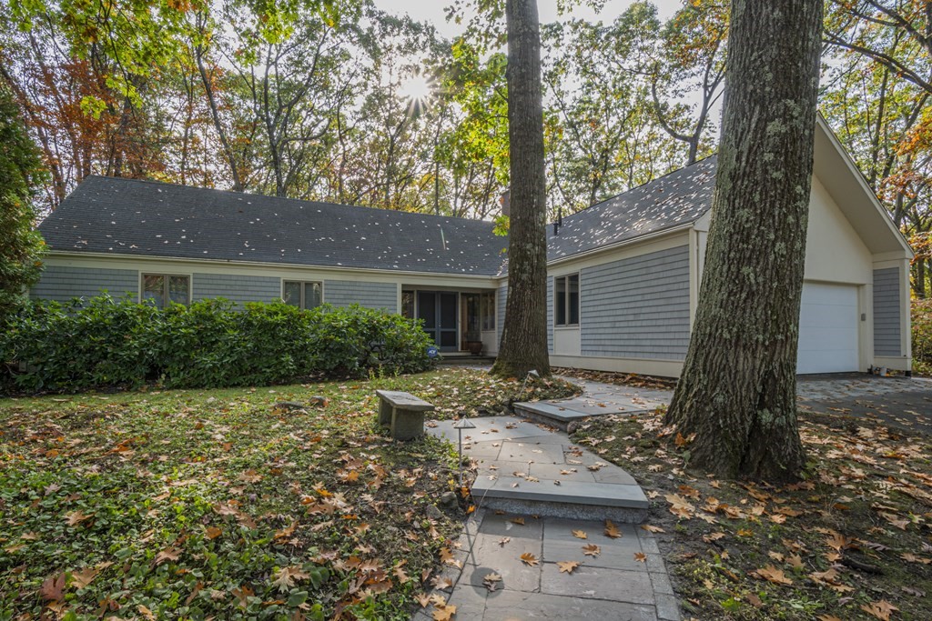 43 Baskin Road Lexington, MA 02421 - Photo 1 of 42 a front view of a house with garden