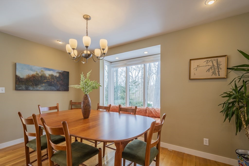 43 Baskin Road Lexington, MA 02421 - Photo 11 of 42 a dining room with furniture and window