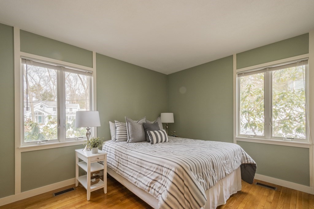 43 Baskin Road Lexington, MA 02421 - Photo 24 of 42 a bedroom with a bed and a window