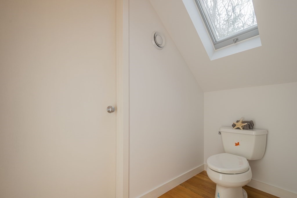 43 Baskin Road Lexington, MA 02421 - Photo 33 of 42 a bathroom with a toilet and a sink
