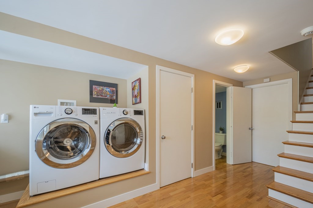 43 Baskin Road Lexington, MA 02421 - Photo 34 of 42 a view of a hallway with washer and dryer