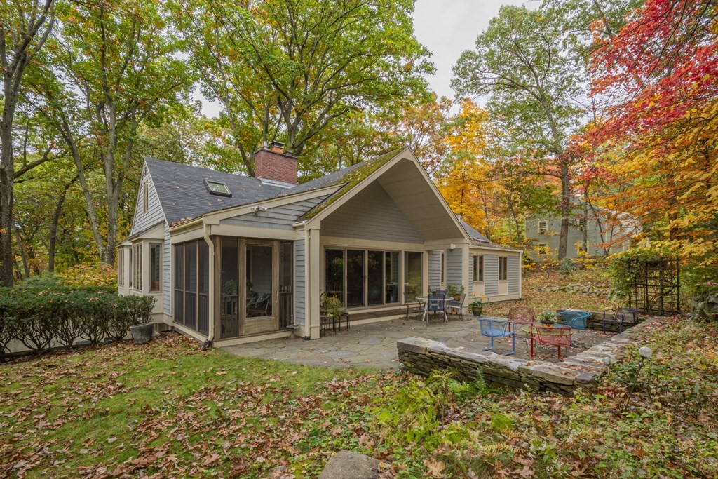 43 Baskin Road Lexington, MA 02421 - Photo 40 of 42 a front view of a house with a yard