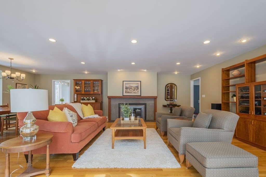 43 Baskin Road Lexington, MA 02421 - Photo 5 of 42 a living room with furniture and a fireplace