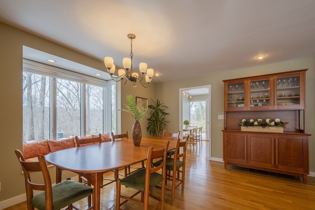 43 Baskin Road Lexington, MA 02421 - Photo 10 of 42 a view of a dining room with furniture window and wooden floor