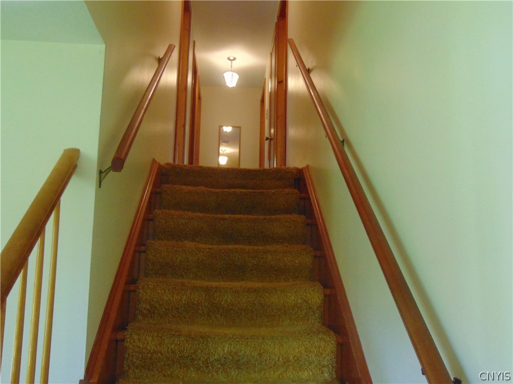 4800 Health Camp Road Homer, NY 13045 - Photo 21 of 40 stair to upper level with 4 bedrooms