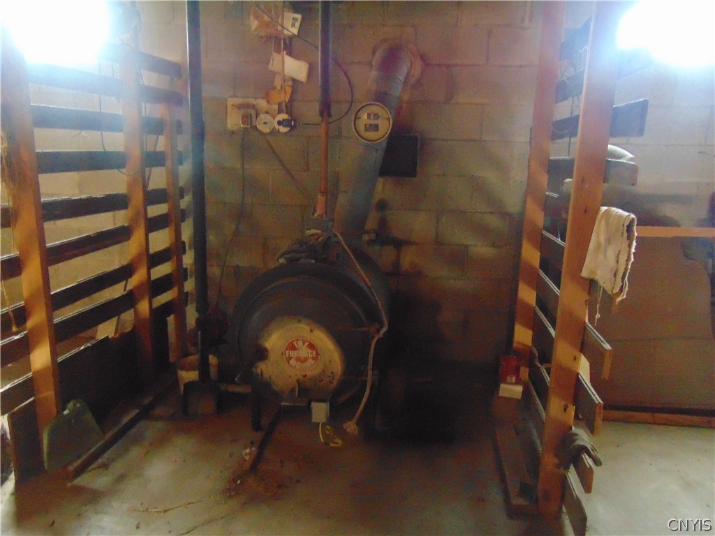 4800 Health Camp Road Homer, NY 13045 - Photo 30 of 40 Wood furnace to be used as backup in basement