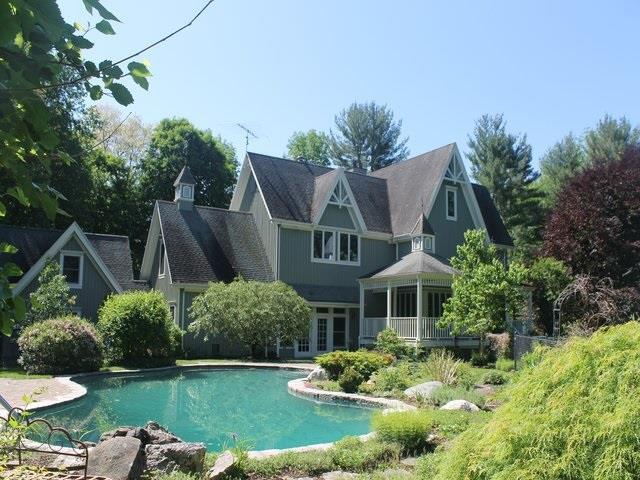 484 North Salem Road Ridgefield, CT 06877 - Photo 1 of 1 a front view of a house with a yard