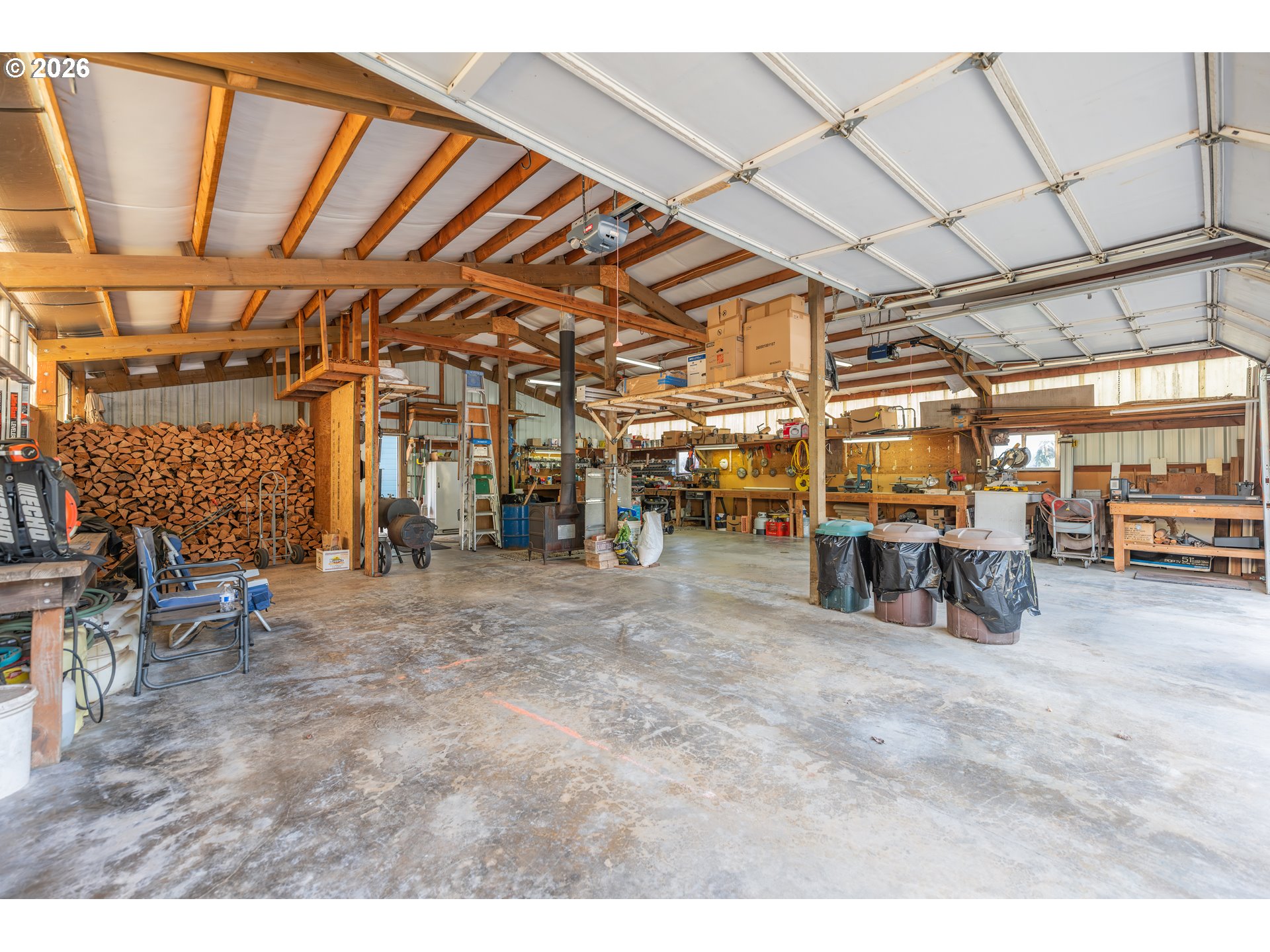 489 Fir Vista Road Sutherlin, OR 97479 - Photo 34 of 47 a view of a garage with table and chairs