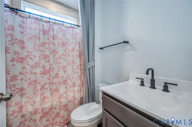 a bathroom with a sink and a toilet