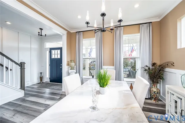 a spacious bedroom with a large bed and a large window