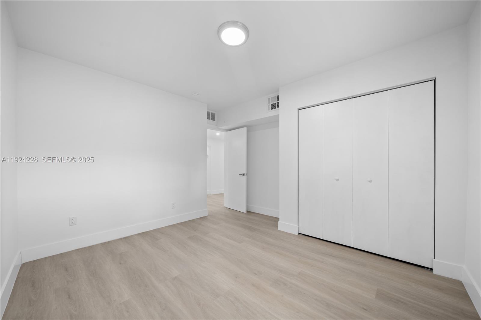 2983 Northwest 1st Street Pompano Beach, FL 33069 - Photo 18 of 28 a view of an empty room