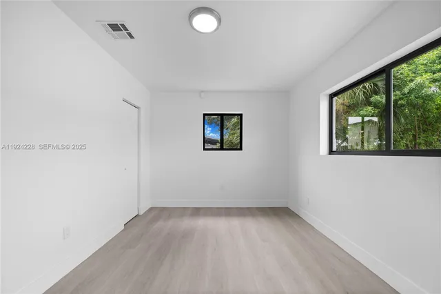 an empty room with a window