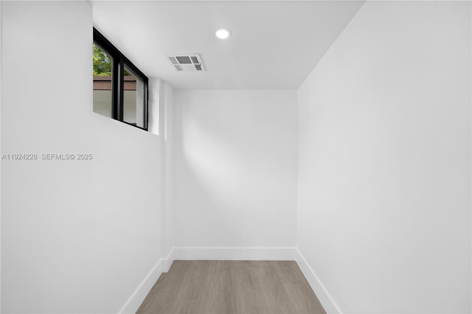 2983 Northwest 1st Street Pompano Beach, FL 33069 - Photo 27 of 28 a view of a hallway
