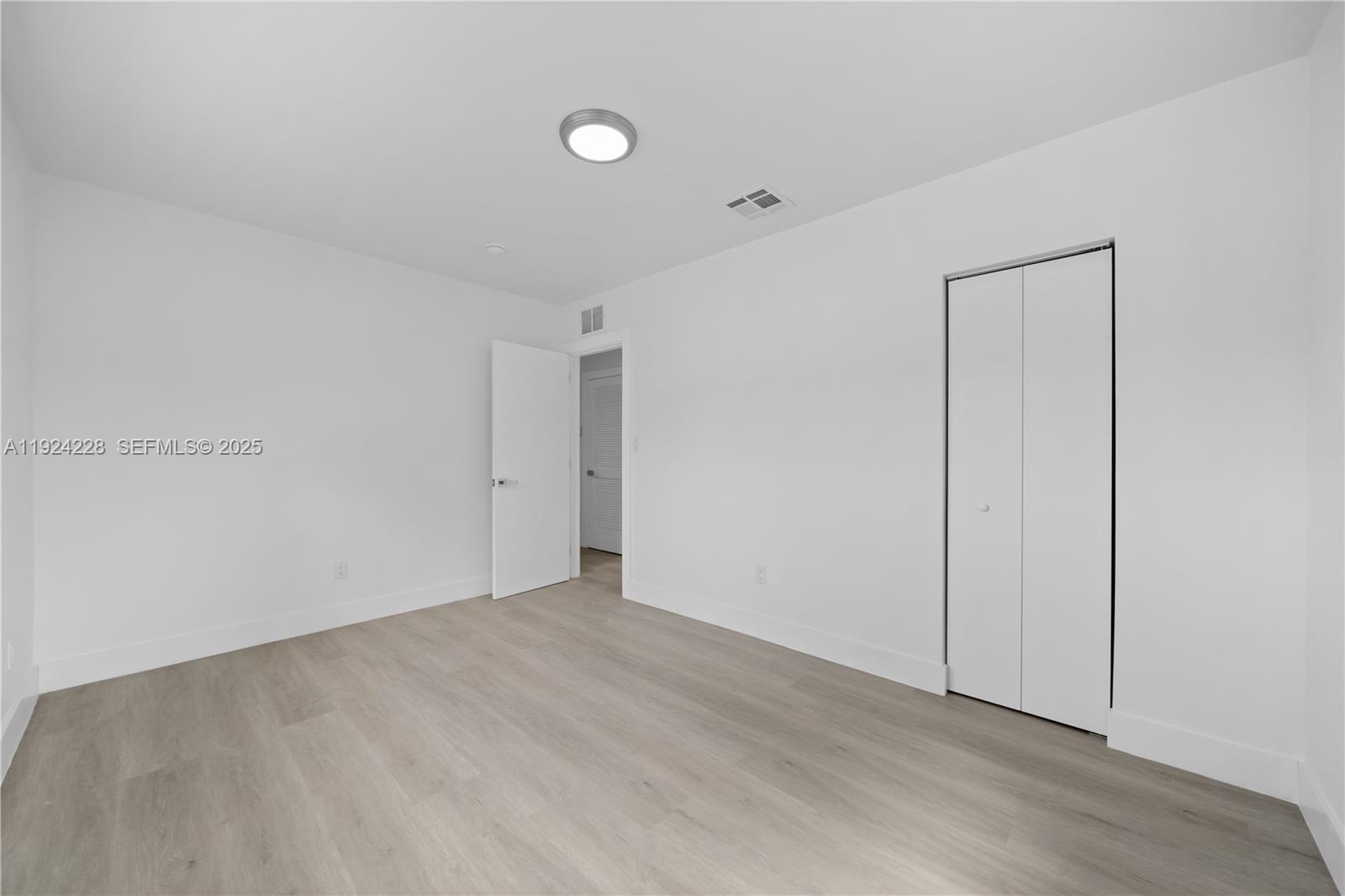 2983 Northwest 1st Street Pompano Beach, FL 33069 - Photo 5 of 28 a view of an empty room