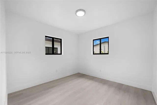 an empty room with windows