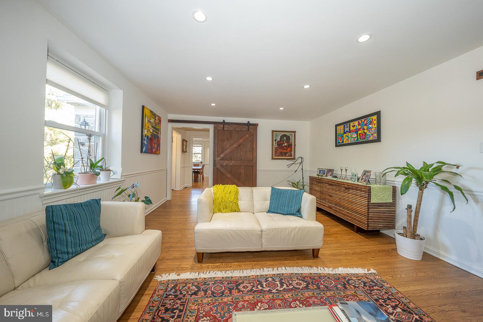 401 North Spring Mill Road Villanova, PA 19085 - Photo 15 of 76 a living room with furniture and a rug