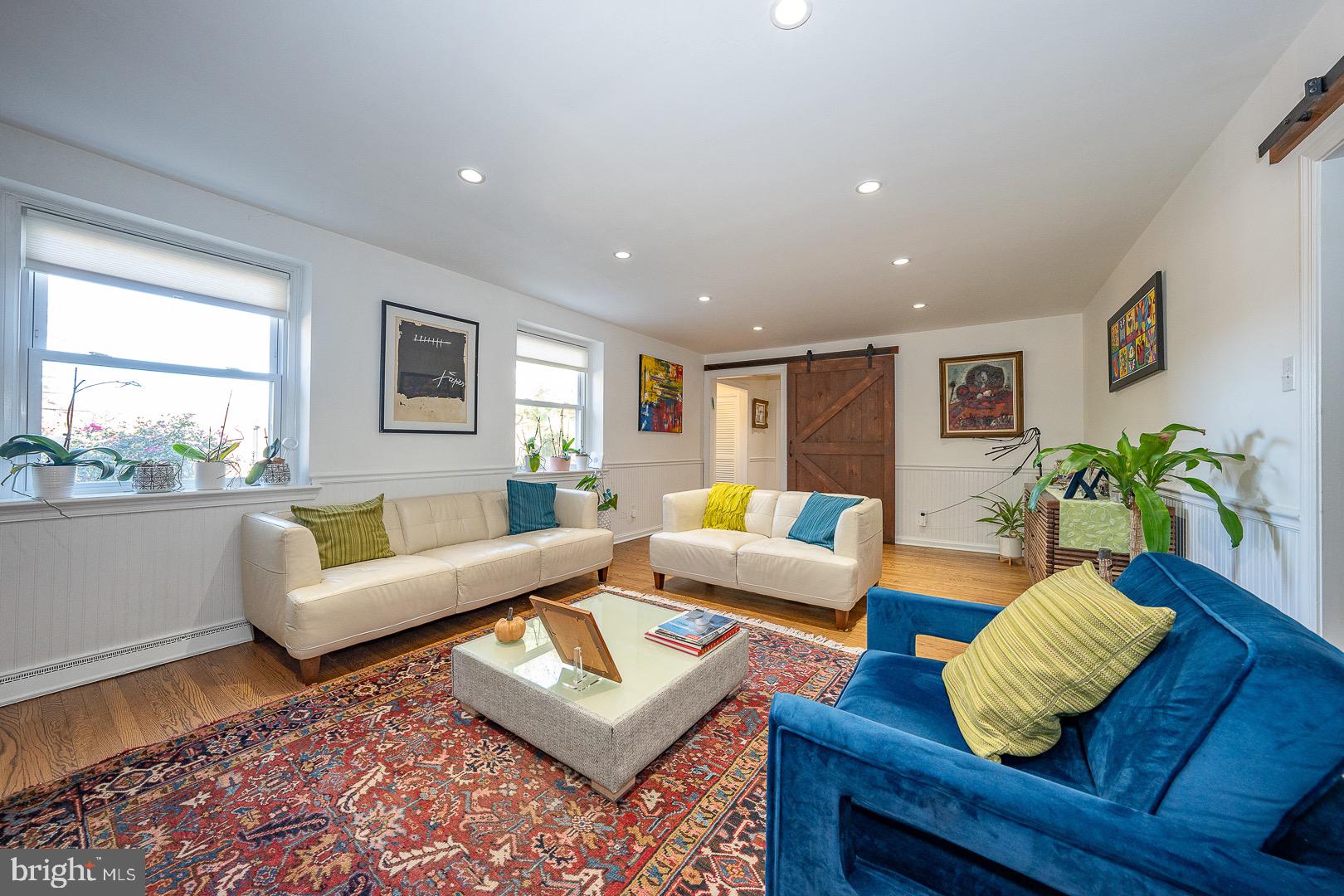 401 North Spring Mill Road Villanova, PA 19085 - Photo 16 of 76 a living room with furniture rug and window