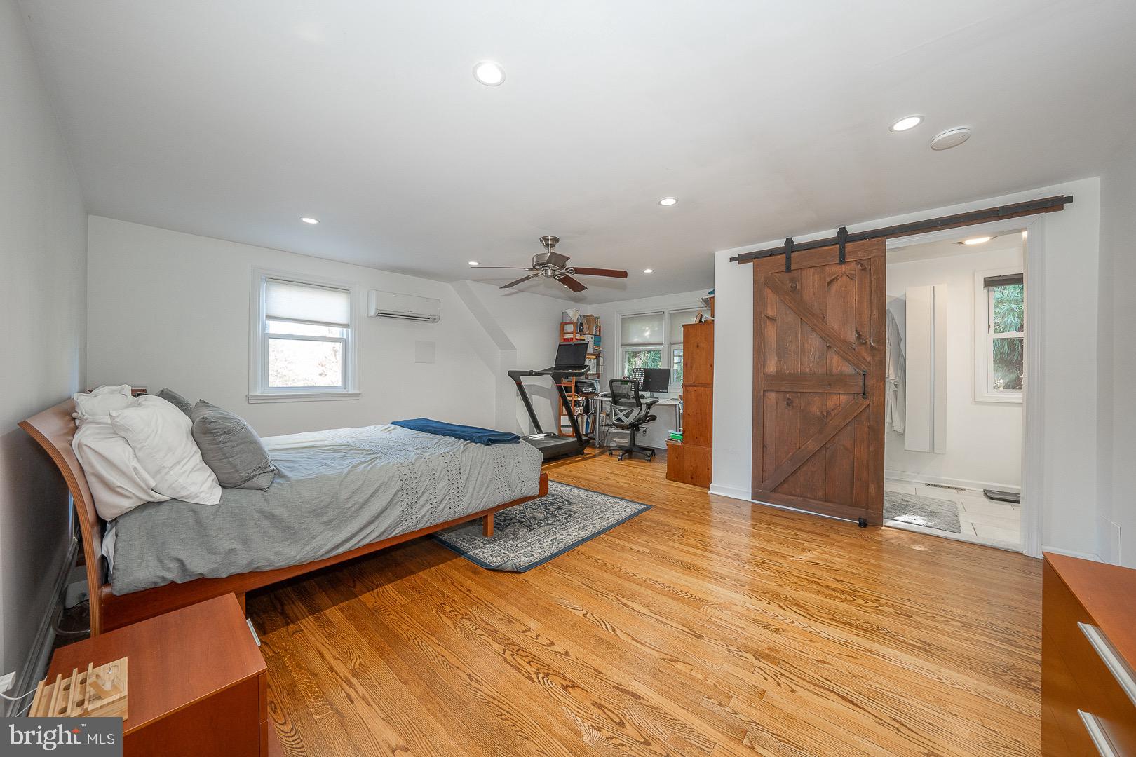 401 North Spring Mill Road Villanova, PA 19085 - Photo 39 of 76 a living room with furniture and a wooden floor