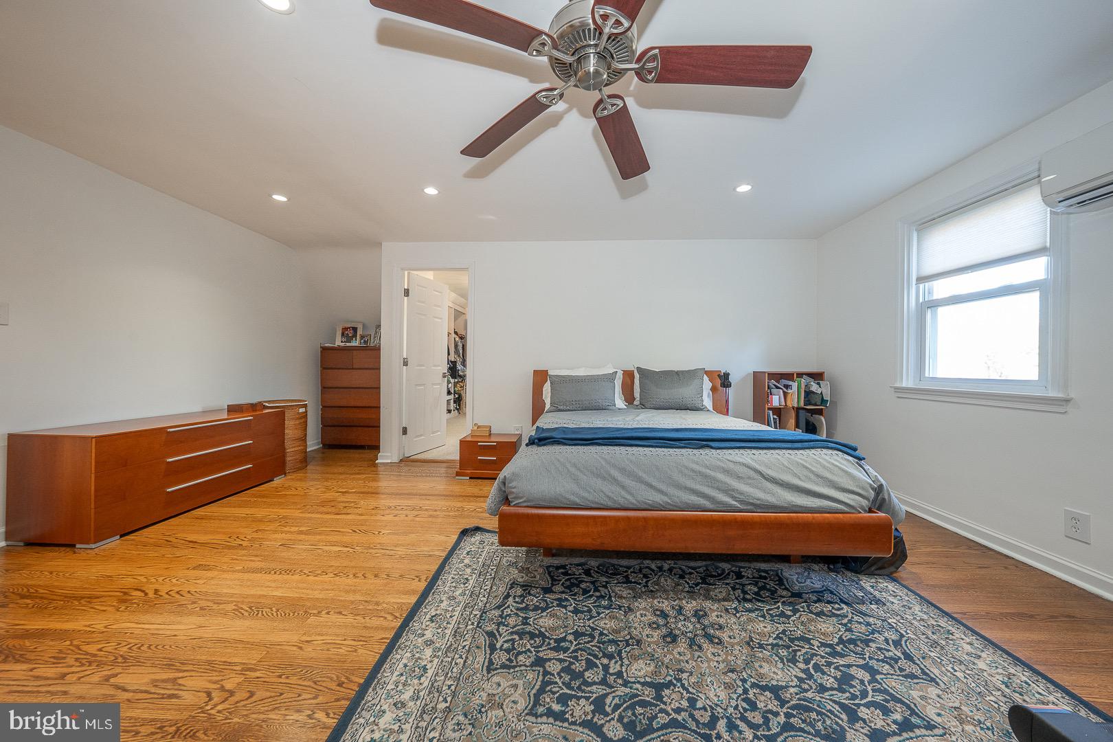 401 North Spring Mill Road Villanova, PA 19085 - Photo 42 of 76 a bedroom with a bed and ceiling fan