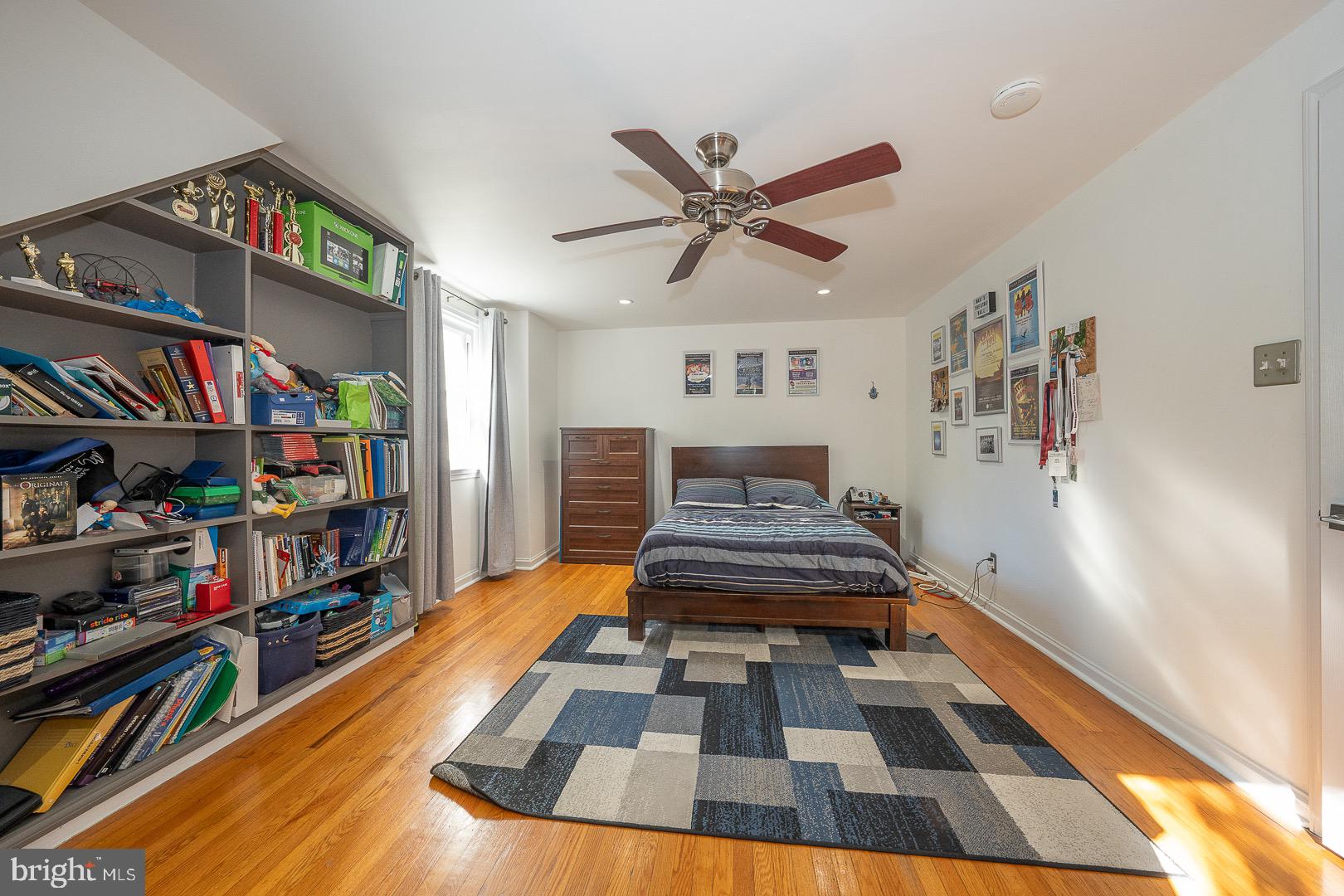 401 North Spring Mill Road Villanova, PA 19085 - Photo 49 of 76 a living room with lots of furniture and a rug