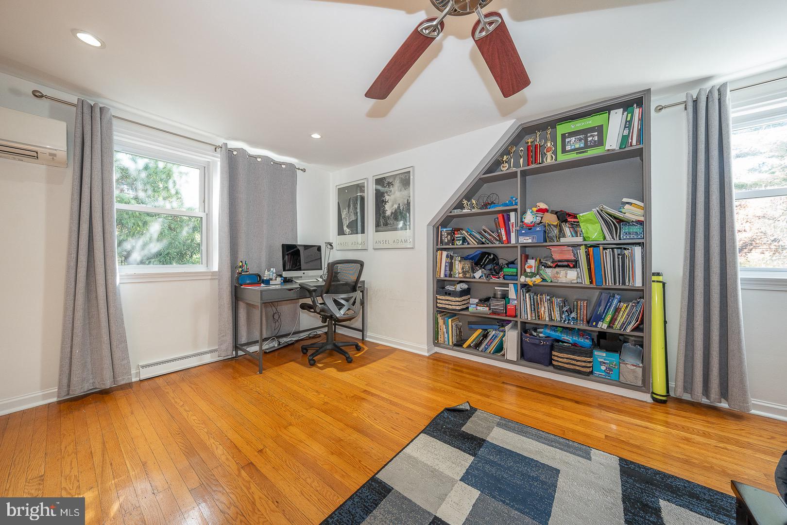 401 North Spring Mill Road Villanova, PA 19085 - Photo 51 of 76 a room with lots of furniture and a window