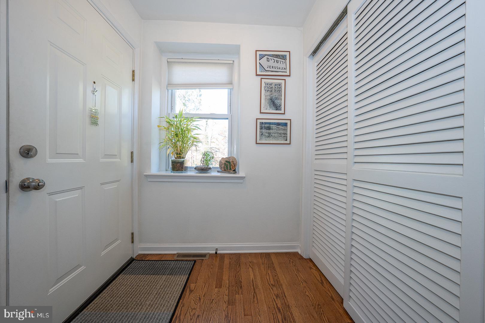 401 North Spring Mill Road Villanova, PA 19085 - Photo 8 of 76 a view of a room with wooden floor and a window