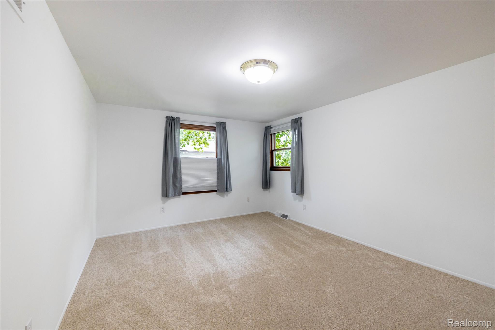 7611 Ferry Road Grosse Ile, MI 48138 - Photo 42 of 51 Neutral tone carpeting throughout